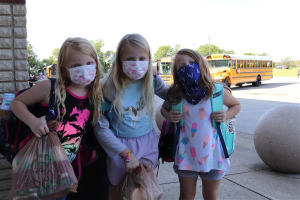 students smile on first day of school